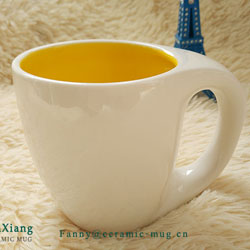 inside yellow ceramic mugs